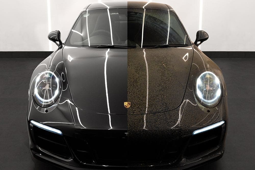 Black Porsche showing a clean, glossy finish after detailing