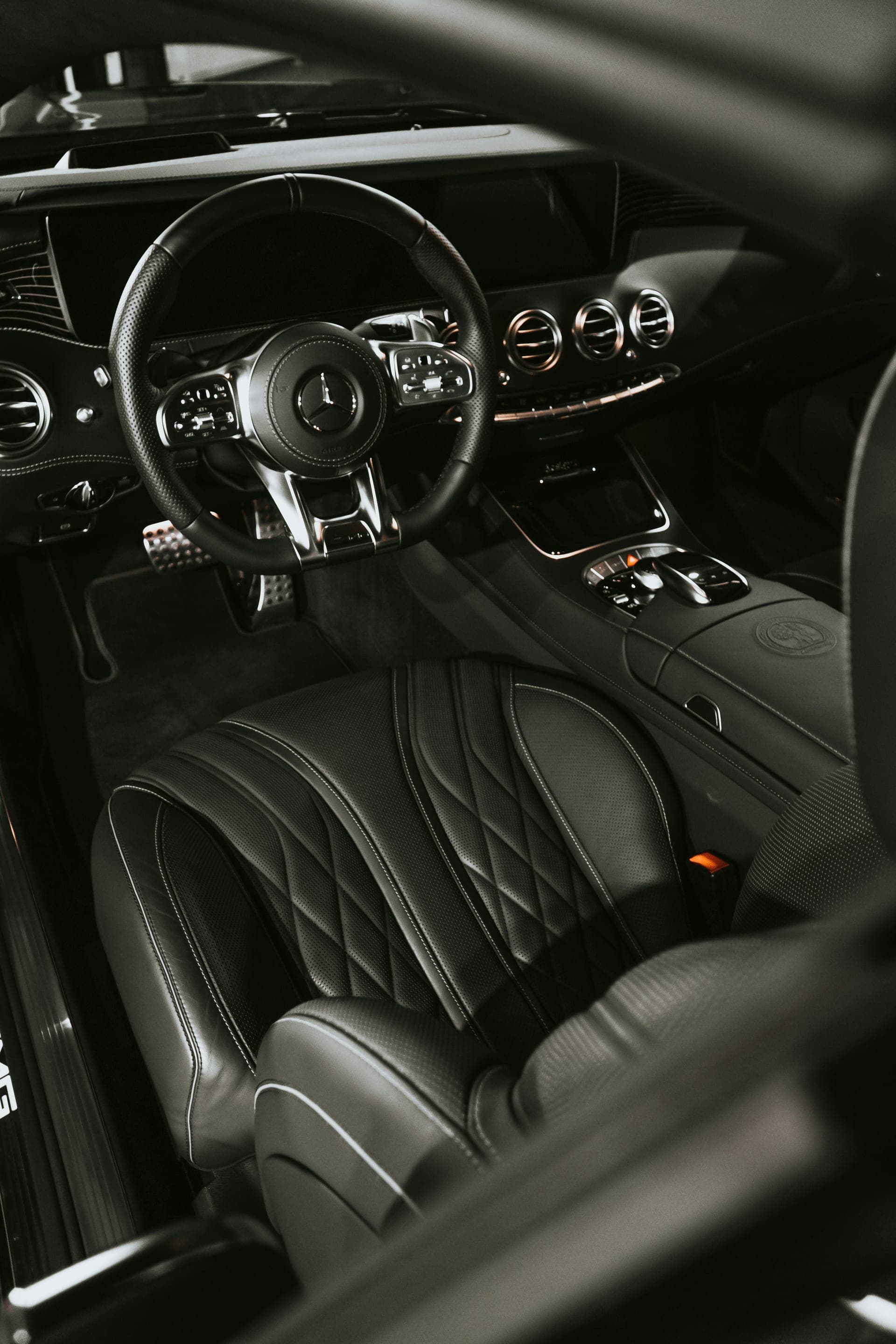 Detailed black leather interior of a Mercedes coupe
